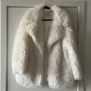 White mid length faux fur coat